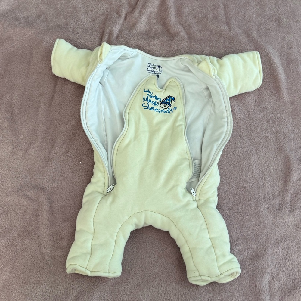 Baby Merlin’s Magic Sleep Suit cream size small